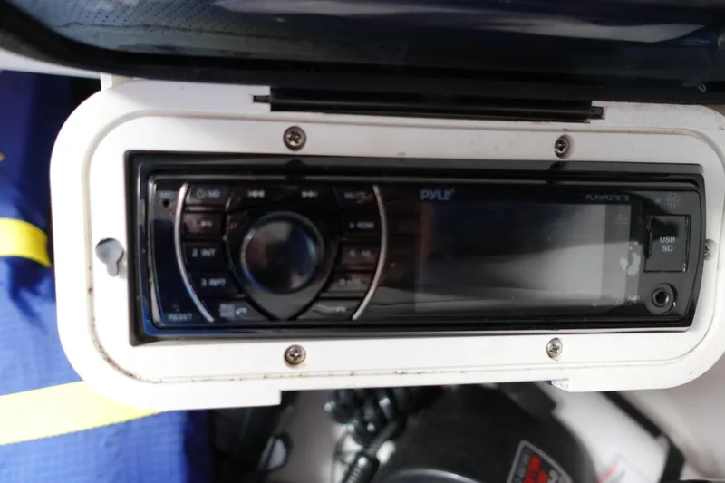 Slide: The Image of 1999 Pro-Line 221 Walk boat stereo system with Pyle audio unit. - 18
