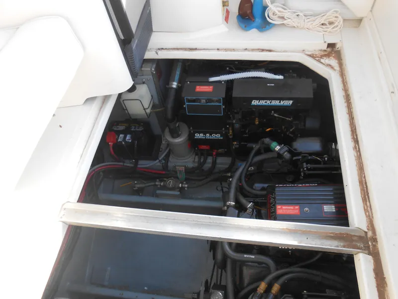 Slide: The Image of Engine compartment of a 1991 Sea Ray Sundancer 310 boat. - 11
