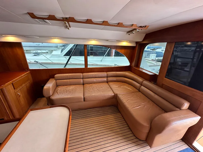 Slide: The Image of 1991 Buddy Davis Convertible yacht docked in a marina. - 7