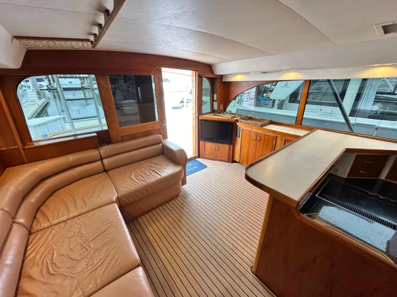 Slide: The Image of 1991 Buddy Davis Convertible yacht docked at marina. - 8