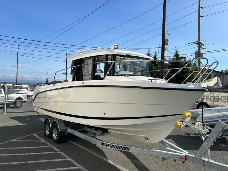 Slide: The Image of 2024 Parker Poland 800 Pilothouse boat on trailer in parking lot. - 4