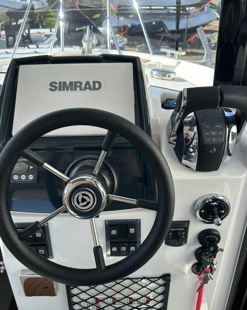 Slide: The Image of 2024 Parker Poland 800 Pilothouse helm with Simrad navigation system. - 8