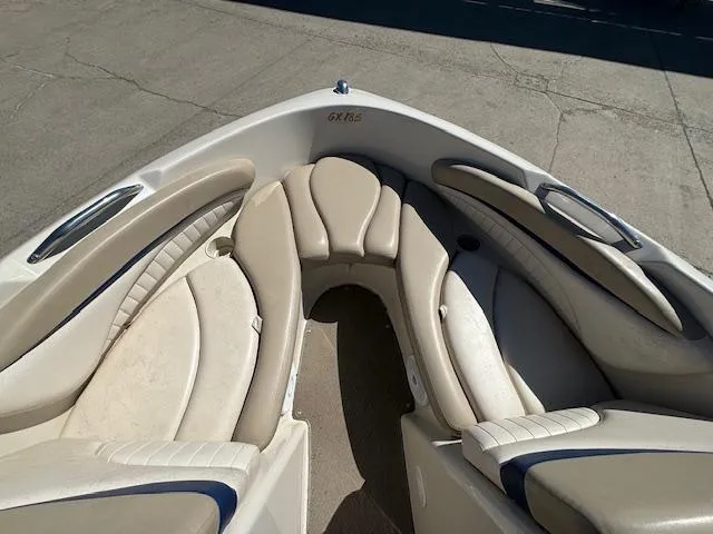 Slide: The Image of 2004 Glastron GX 185 boat interior with beige seating. - 20