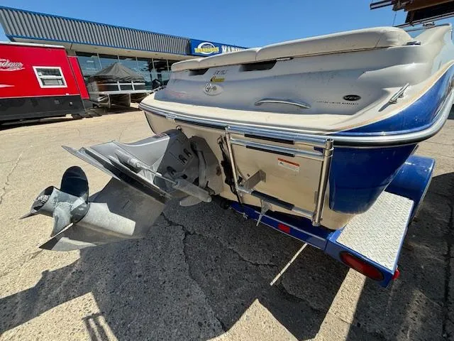 Slide: The Image of 2004 Glastron GX 185 boat rear view with outboard motor. - 3