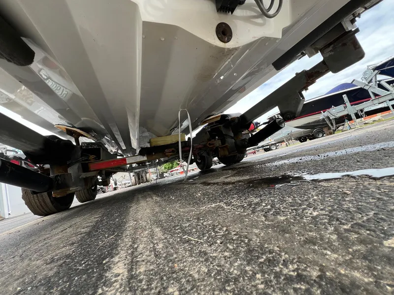 Slide: The Image of Underneath view of a 2003 Sea Ray 270 boat on a trailer. - 11