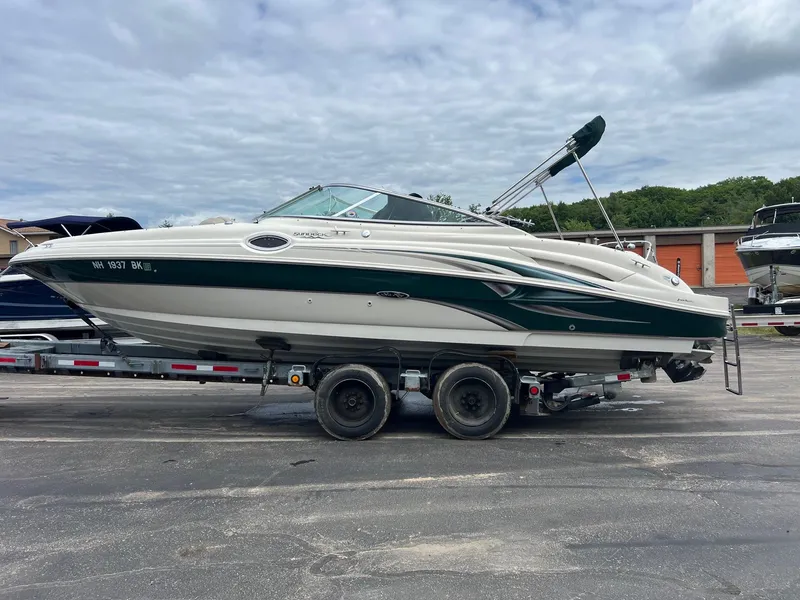 Slide: The Image of 2003 Sea Ray 270 boat on a trailer, side view. - 8