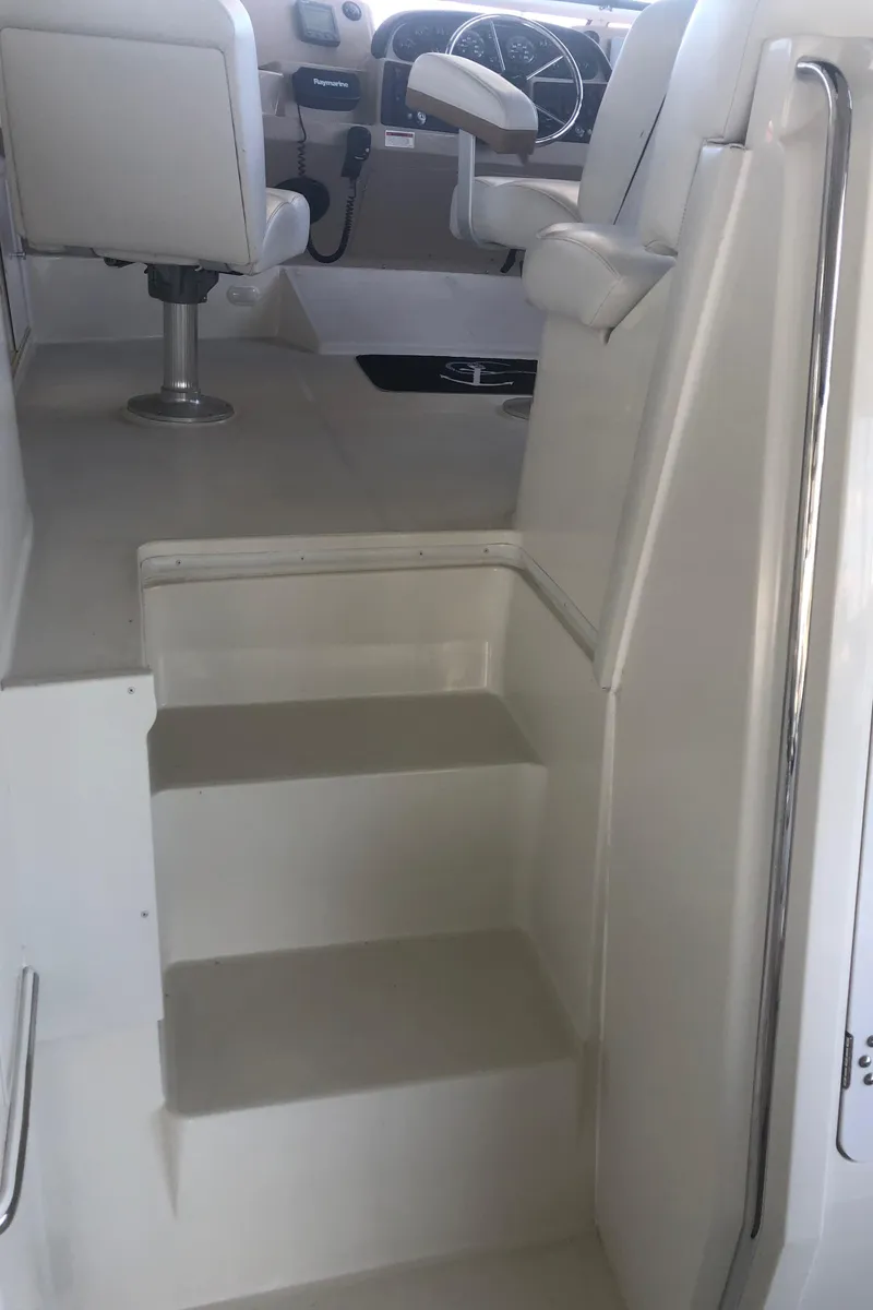 Slide: The Image of Staircase leading to the helm of a 2005 Carver 41 Cockpit Motor Yacht. - 23
