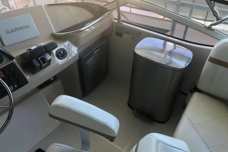 Slide: The Image of 2005 Carver 41 Cockpit Motor Yacht helm with Garmin navigation system. - 29