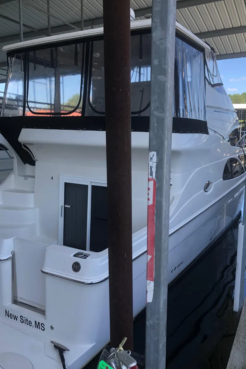 Slide: The Image of 2005 Carver 41 Cockpit Motor Yacht docked in New Site, MS. - 7