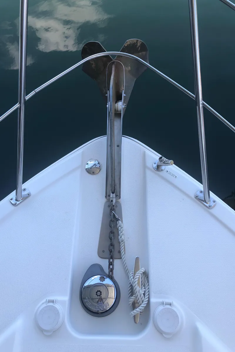 Slide: The Image of Bow of 2005 Carver 41 Cockpit Motor Yacht with anchor and chain. - 20