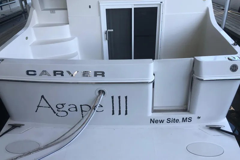 Slide: The Image of 2005 Carver 41 Cockpit Motor Yacht, rear view, docked, named Agape III from New Site, MS. - 8