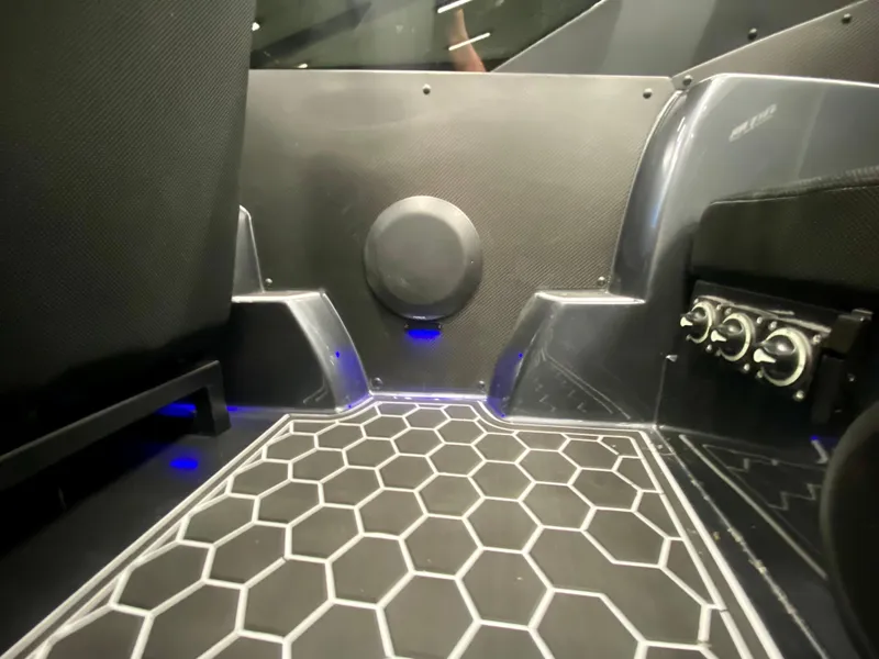 Slide: The Image of Interior of 2024 Nitra Boats 30 SkyTop with hexagonal floor design. - 22