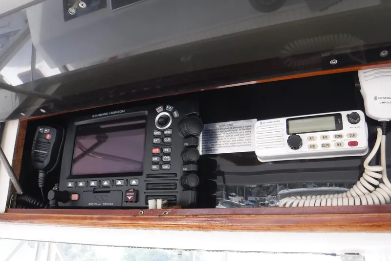 Slide: The Image of Marine radio equipment on 1989 Ocean Yachts 44 Super Sport Custom boat. - 38