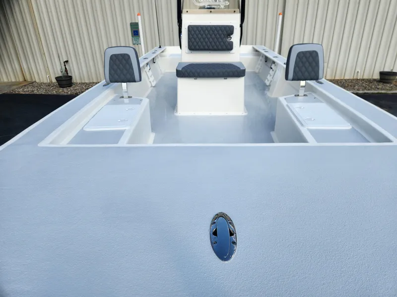 Slide: The Image of 2025 May-Craft 22 Hancock Edition boat interior with seating and storage compartments. - 6