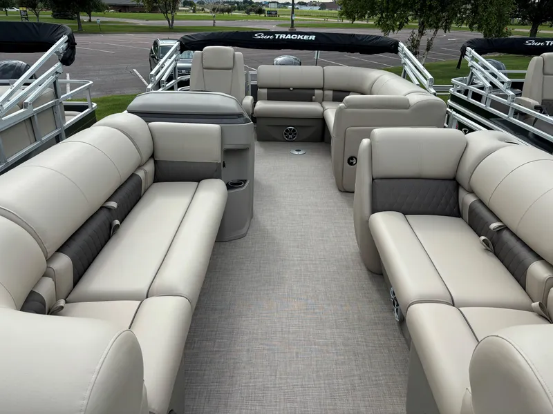 Slide: The Image of 2024 Sun Tracker Party Barge 20 DLX pontoon boat with spacious seating and modern design. - 6