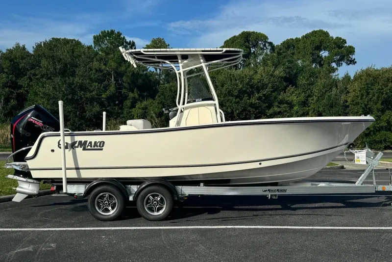 Slide: The Image of 2024 Mako 214 CC center console boat on a trailer. - 3