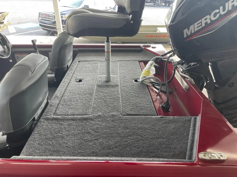 Slide: The Image of 2024 Tracker Pro 170 boat interior with Mercury outboard motor. - 7