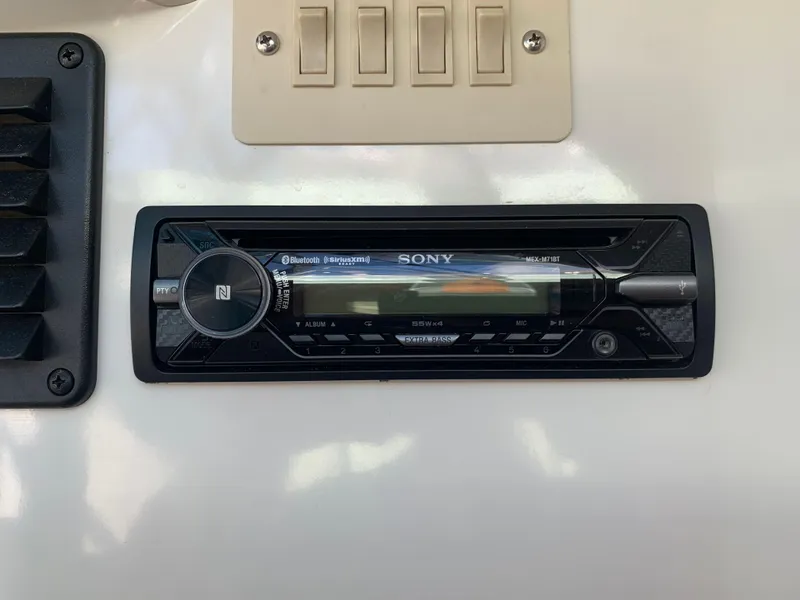 Slide: The Image of Sony Bluetooth stereo system in a 1998 Maxum 2800 SCR boat. - 23