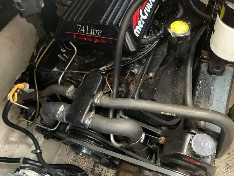 Slide: The Image of Engine compartment of a 1998 Maxum 2800 SCR boat with 7.4L MerCruiser engine. - 34