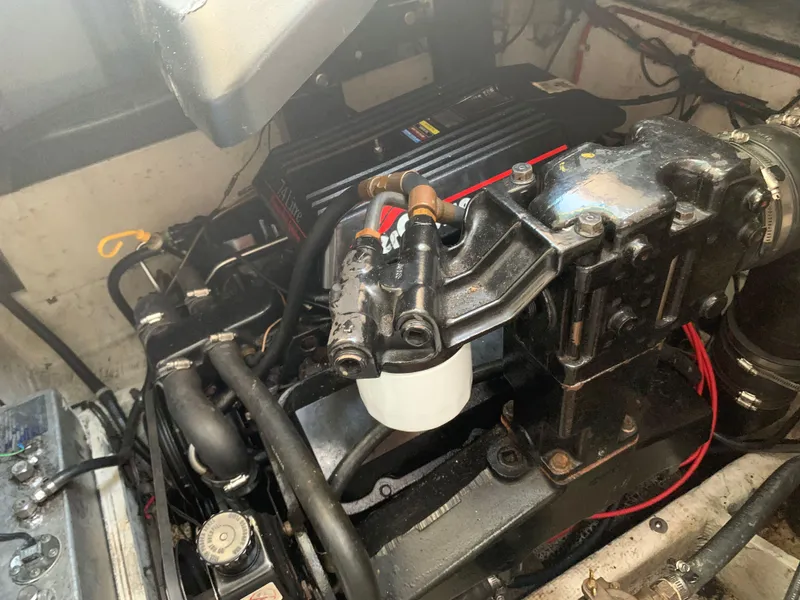 Slide: The Image of 1998 Maxum 2800 SCR engine compartment with visible components and wiring. - 37