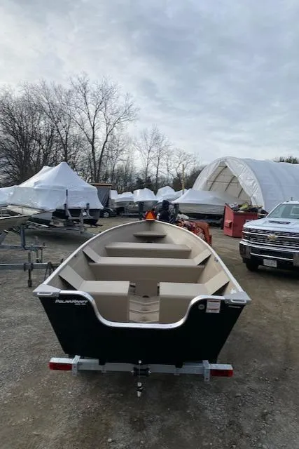 Slide: The Image of 2024 Polar Kraft Dakota 1670L boat on a trailer in a storage yard. - 5