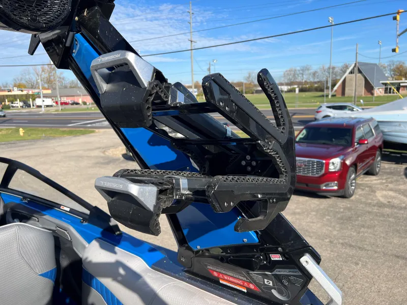 Slide: The Image of 2023 Centurion Fi25 wakeboard rack on blue boat. - 3