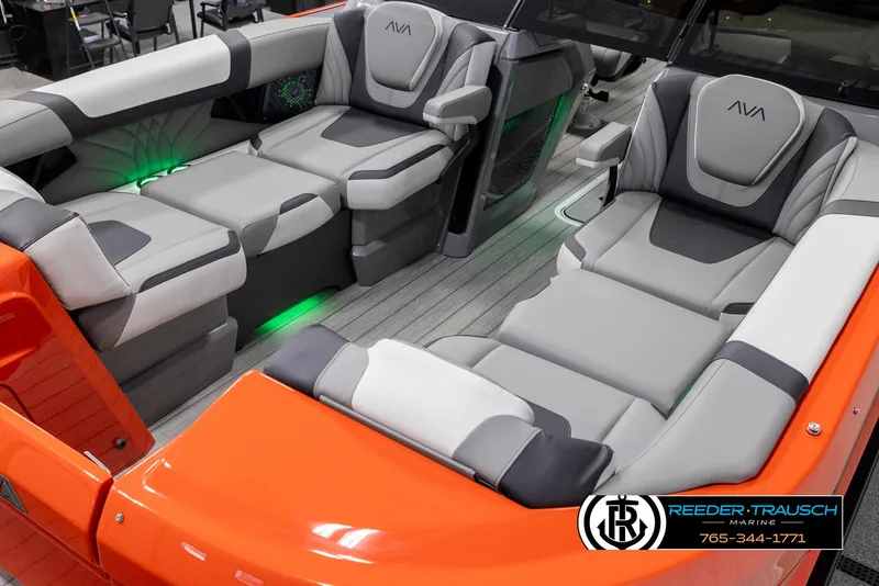 Slide: The Image of 2024 Avalon Excalibur VRB boat interior with luxurious seating and ambient lighting. - 10