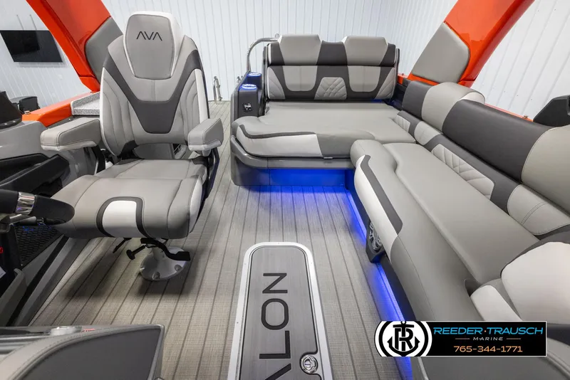 Slide: The Image of 2024 Avalon Excalibur VRB interior with luxurious seating and ambient blue lighting. - 14