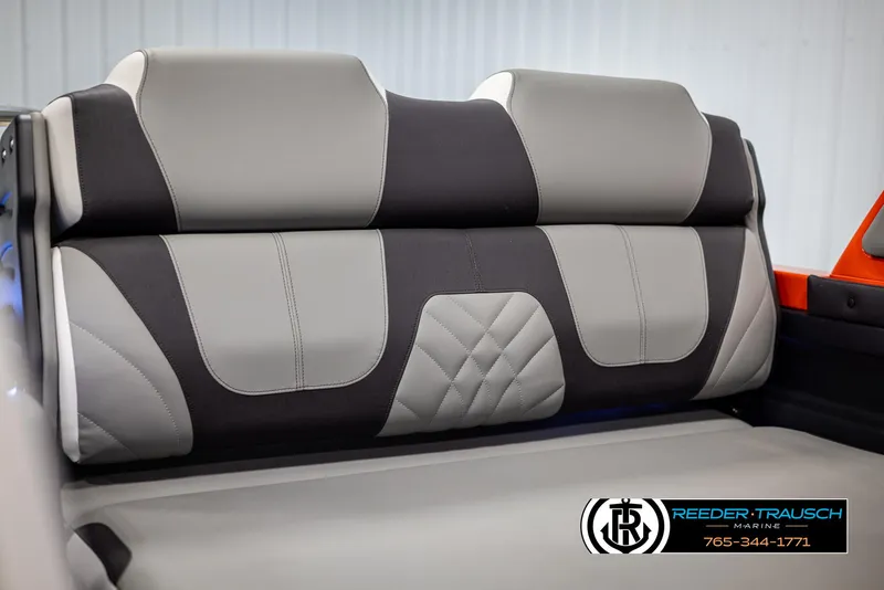 Slide: The Image of 2024 Avalon Excalibur VRB boat seat with modern black and gray upholstery. - 43