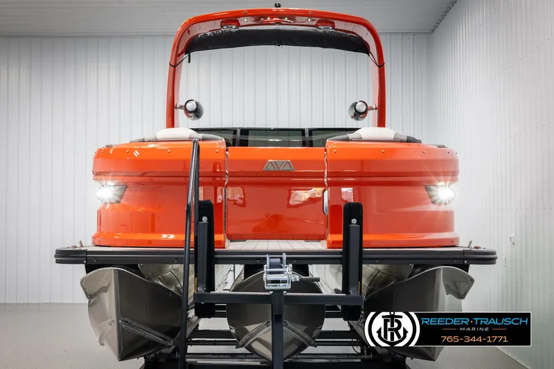 Slide: The Image of 2024 Avalon Excalibur VRB pontoon boat in showroom, front view. - 8