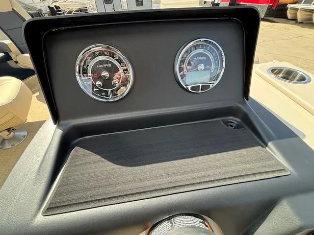Slide: The Image of Dashboard of 2024 Harris Cruiser 230 CWDH pontoon boat with gauges. - 18