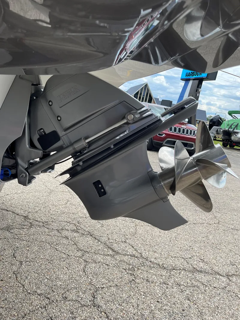 Slide: The Image of Close-up of 2025 Crownline 240 SS boat propeller and outdrive. - 13