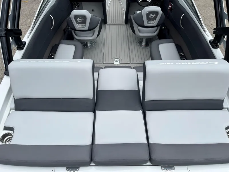 Slide: The Image of 2025 Crownline 240 SS boat interior with gray and white seating. - 2