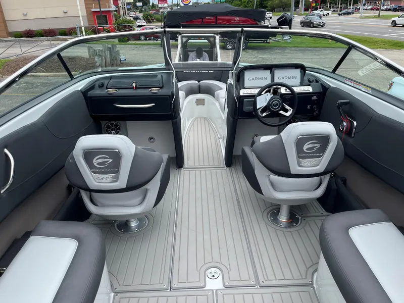 Slide: The Image of Interior of 2025 Crownline 240 SS boat with modern dashboard and seating. - 3