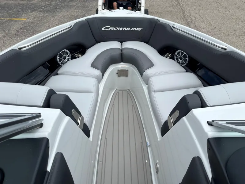 Slide: The Image of 2025 Crownline 240 SS boat interior with gray and white seating. - 4