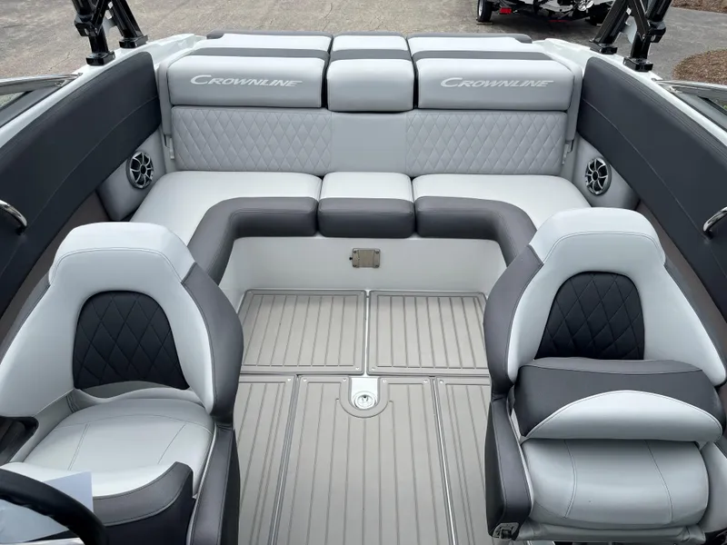 Slide: The Image of 2025 Crownline 240 SS boat interior with luxurious seating and modern design. - 6