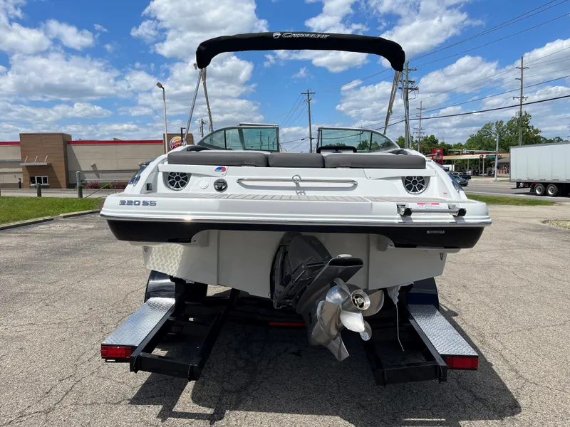 Slide: The Image of 2025 Crownline 220 SS boat on trailer, rear view. - 11