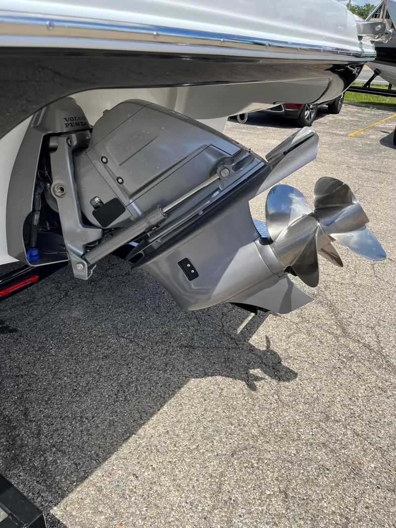 Slide: The Image of Close-up of 2025 Crownline 220 SS boat propeller and stern drive. - 12