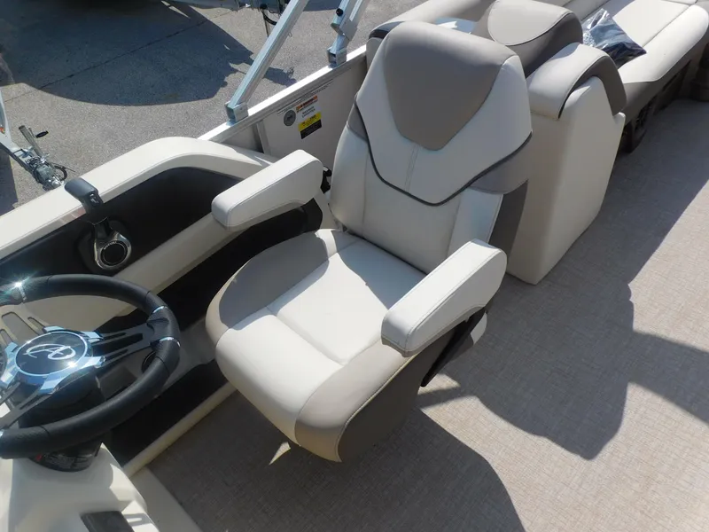 Slide: The Image of 2024 Avalon LSZ Quad Lounger boat captain's chair and helm station. - 14
