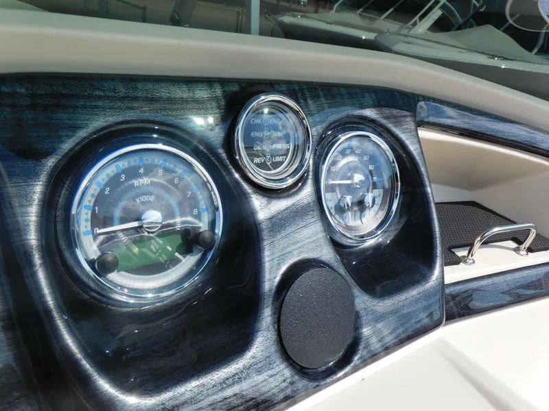 Slide: The Image of Close-up of 2024 Avalon LSZ Quad Lounger dashboard with gauges and controls. - 16