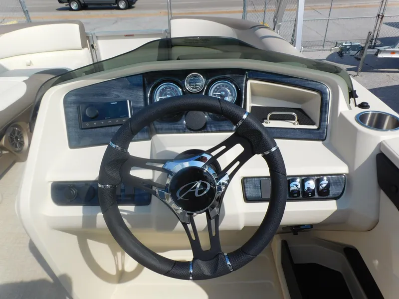Slide: The Image of 2024 Avalon LSZ Quad Lounger dashboard and steering wheel. - 18