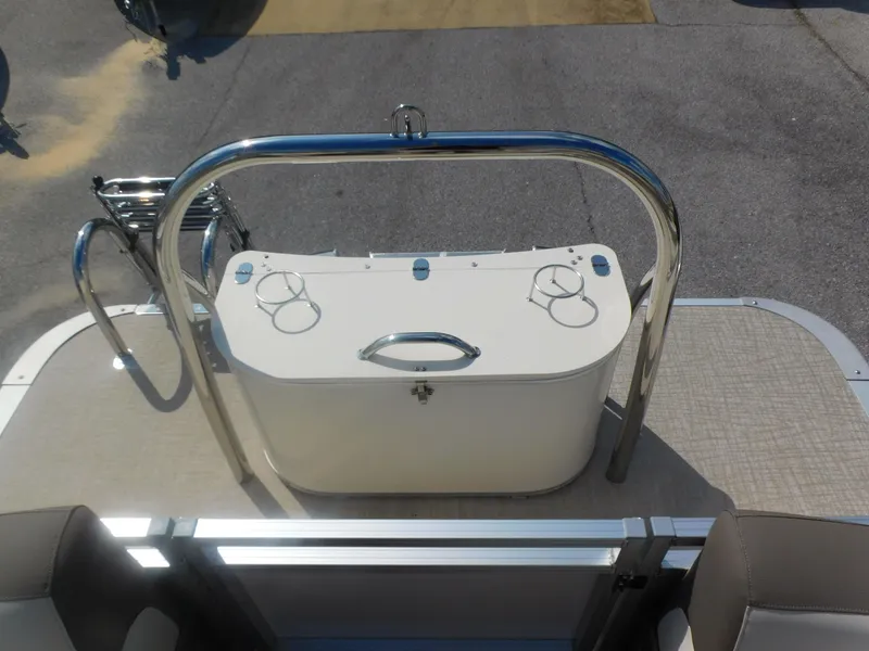 Slide: The Image of 2024 Avalon LSZ Quad Lounger boat with rear view of the deck and stainless steel railing. - 20