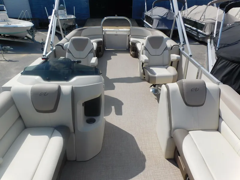 Slide: The Image of 2024 Avalon LSZ Quad Lounger pontoon boat with luxurious seating and modern design. - 8
