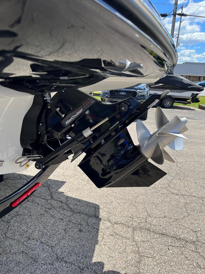 Slide: The Image of 2025 Crownline 290 SS boat propeller and stern drive detail. - 15