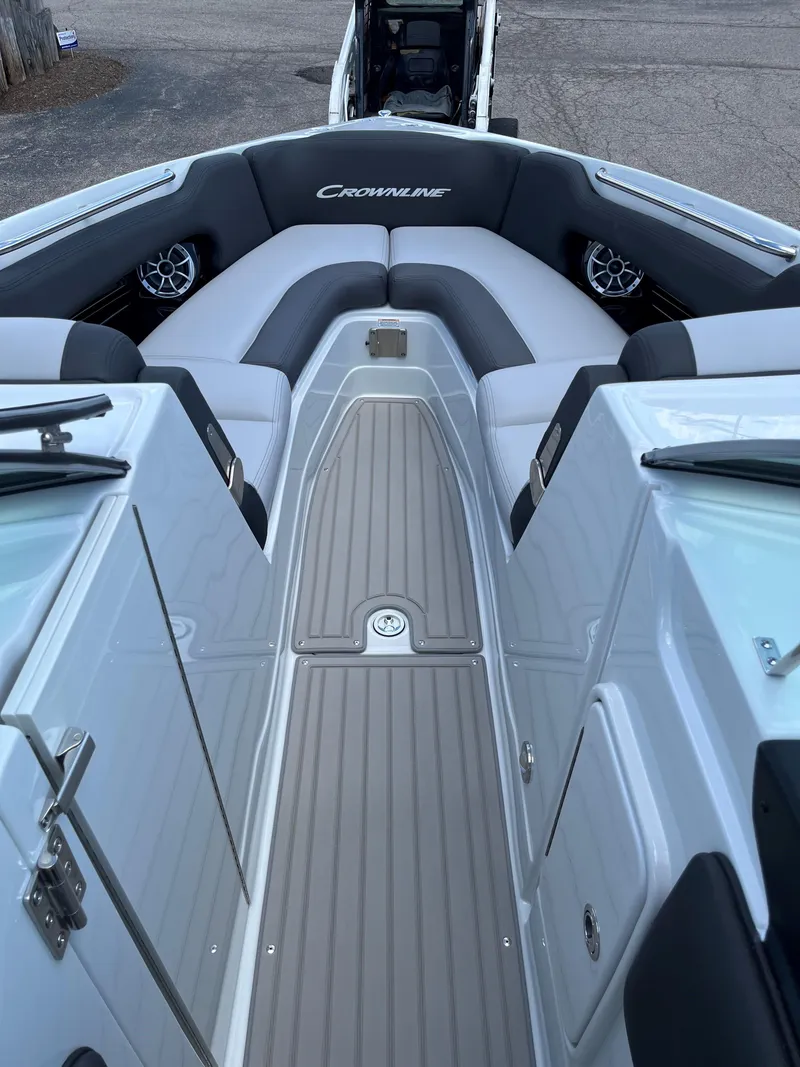 Slide: The Image of 2025 Crownline 290 SS boat interior with gray and white seating. - 3