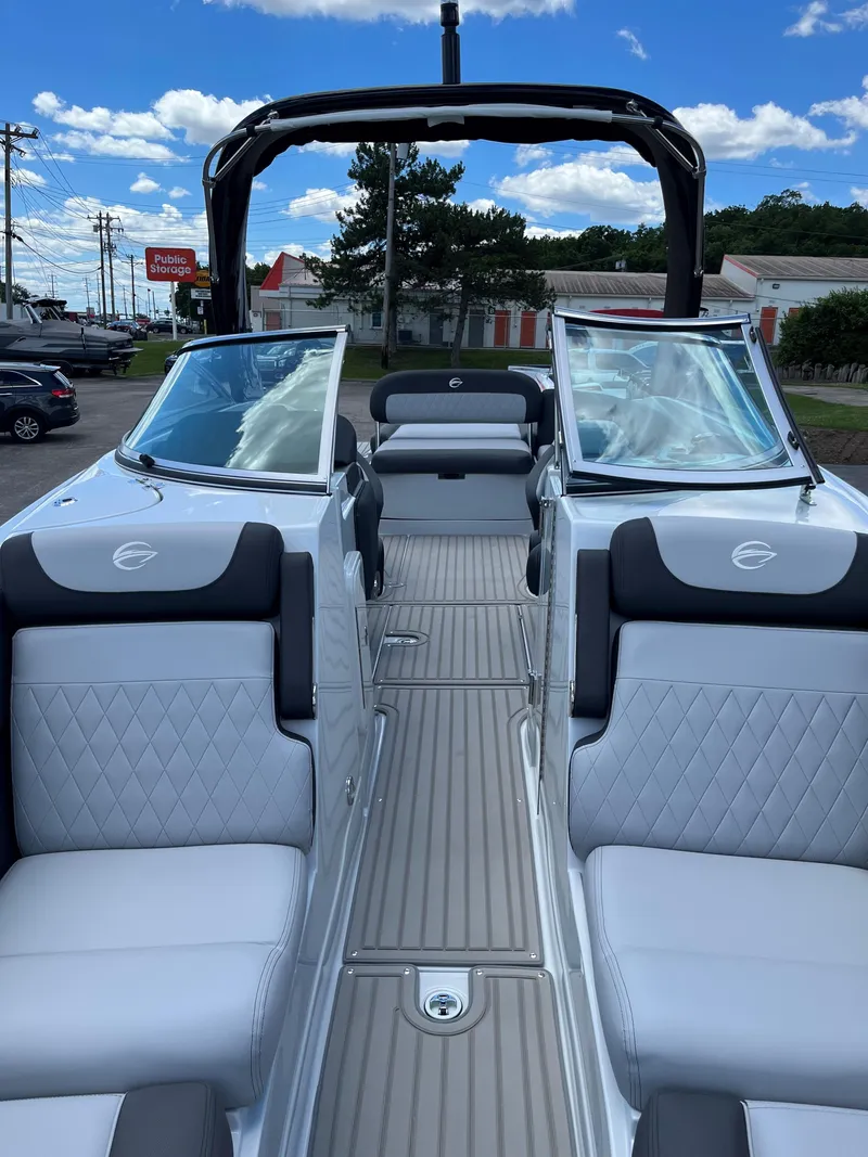 Slide: The Image of 2025 Crownline 290 SS boat interior with luxurious seating and modern design. - 4
