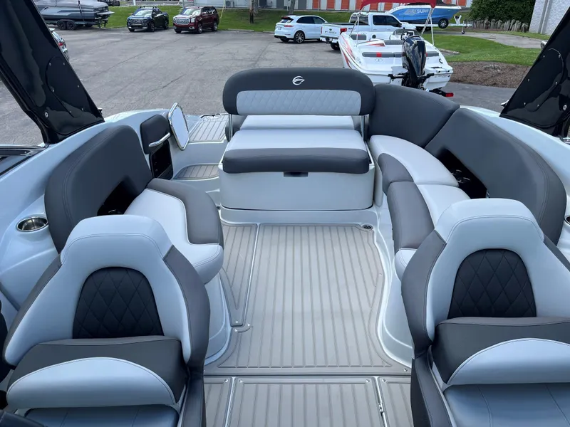Slide: The Image of 2025 Crownline 290 SS boat interior with luxurious seating and modern design. - 5