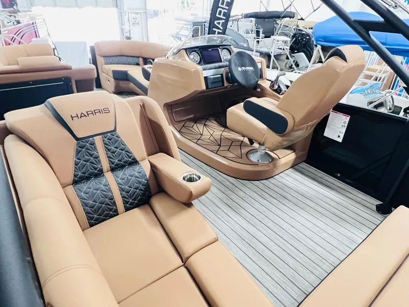 Slide: The Image of Luxurious interior of 2025 Harris Grand Mariner 230 pontoon boat with plush seating. - 11