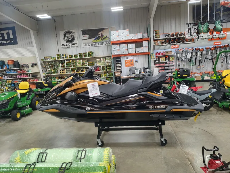 Slide: The Image of 2024 Yamaha WaveRunner FX Limited SVHO displayed in a showroom with various equipment. - 11