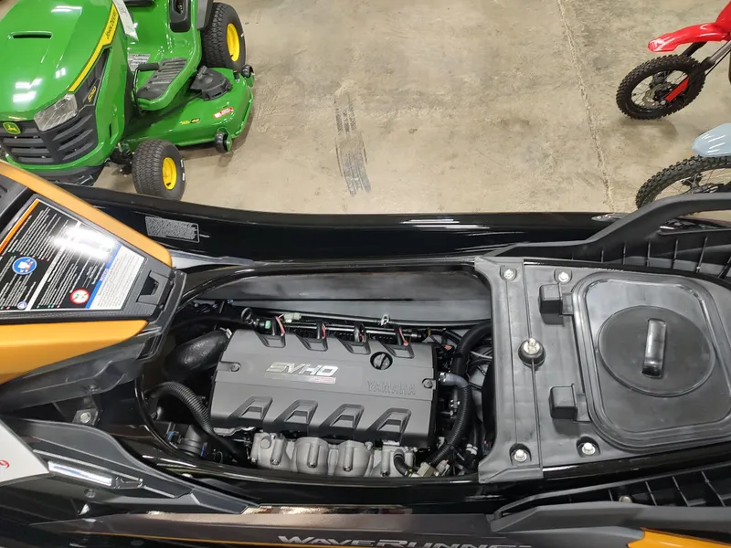 Slide: The Image of 2024 Yamaha WaveRunner FX Limited SVHO engine compartment in a garage. - 17